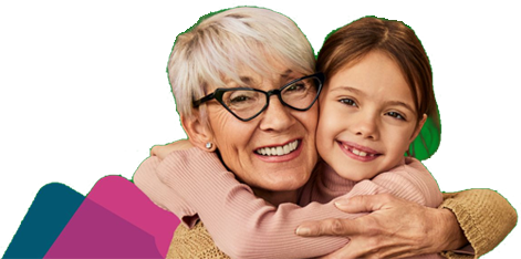 A lady hugging a child
